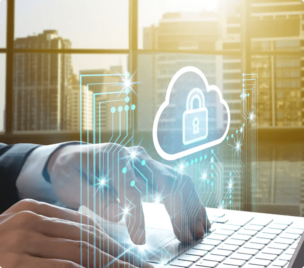 Business user working on a laptop with a cloud security lock overlay representing secure cloud collaboration with IRM/DRM encryption.